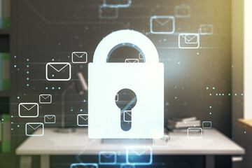 Double exposure of creative lock hologram with email symbols and modern desktop with laptop on...