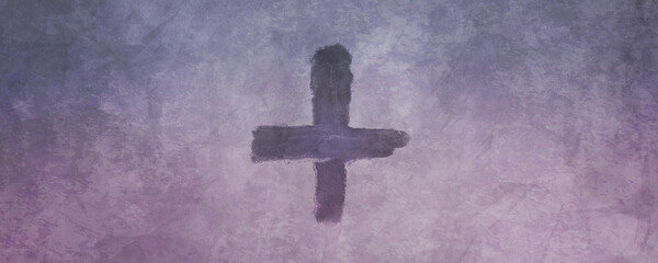 Cross made from ashes. Symbolic of Ash Wednesday. On vintage purple, gray background.