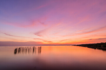 Fototapeta na wymiar Landscape of sea coast during twilight time. Evening sunset.