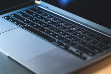Work On Laptop Pc. Close up image of hands typing text or programming code using the computer at home.
Businessman working on laptop on the table.