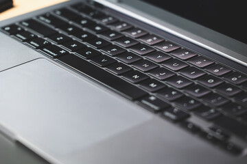 Work On Laptop Pc. Close up image of hands typing text or programming code using the computer at home.
Businessman working on laptop on the table.