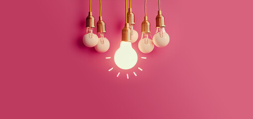 light bulbs glow on the Magenta background