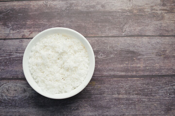slice of fresh coconut flakes in a bowl on a table 