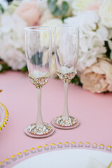 Champagne glasses decorated with precious stones