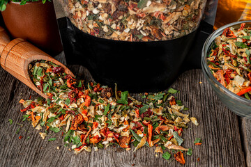 Small pieces of dried vegetables in jar , dry celery, dry ccarrot and dry onion. Spice shop.