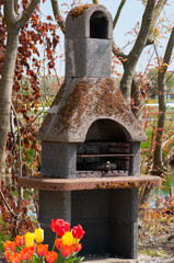 Outdoor vintage BBQ fireplace. Outdoor barbecue grill in the park.Place to relax.
