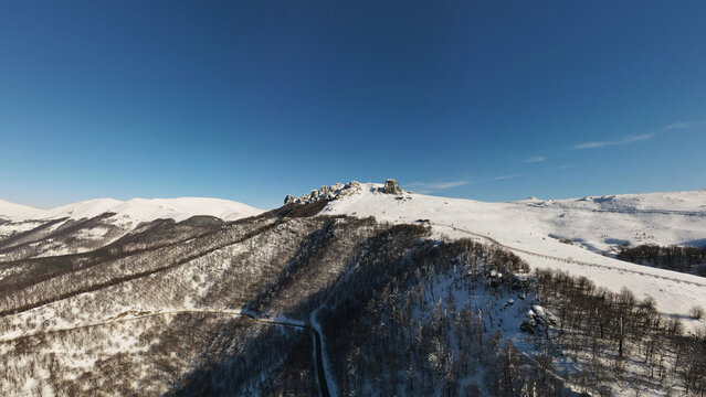 Stara Planina Babin Zub mountain in serbia covered with snow with road in winter day panorama tourist destination and ski center in Serbia Babin Zub Peak