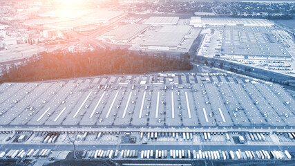 Aerial view of truck loading in logistics warehouse