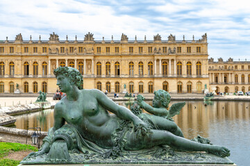 Palace Versailles with beautiful gardens and fountains from top. The Palace Versailles was a royal...