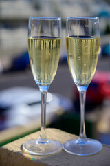 Dinner party, drinking of cava or champagne sparkling wine in vacation resort Caleta Fuste, Fuerteventura, Canary islands vacation, Spain