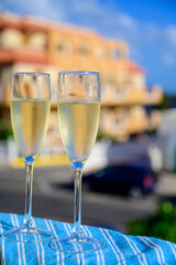 Dinner party, drinking of cava or champagne sparkling wine in vacation resort Caleta Fuste, Fuerteventura, Canary islands vacation, Spain