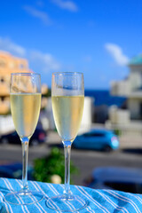 Dinner party, drinking of cava or champagne sparkling wine in vacation resort Caleta Fuste, Fuerteventura, Canary islands vacation, Spain