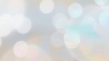 Abstract blurred grey background with bokeh.