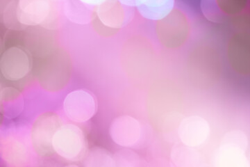 Blurred abstract background with bokeh lights. Lilac, purple, magenta color.