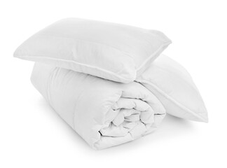 Fototapeta na wymiar Soft blanket with pillows on white background
