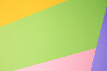 Colorful sheets of paper as background, top view