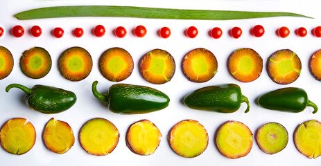 Pattern of sliced vegetables on a white background. Food ingredients. 