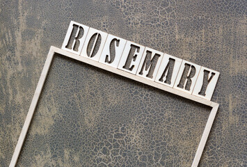 rosemary and thin wood frame on scrapbook paper with crackled texture