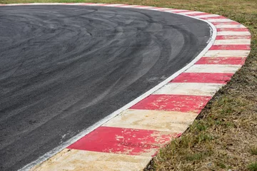 Tafelkleed Abstract texture surface and background of car tire drift skid mark on road race track, Black tire mark on street race track, Automobile and automotive concept. © Kalyakan