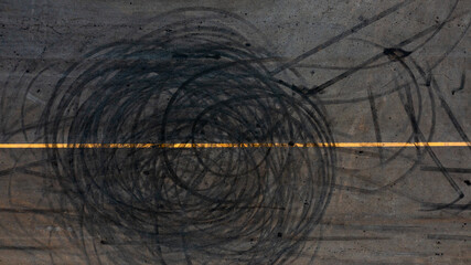 Tire track mark on asphalt tarmac road race track texture and background, Abstract background black...