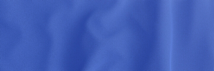 Blue wavy fabric background.