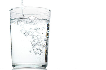 glass of crystal clear water in motion