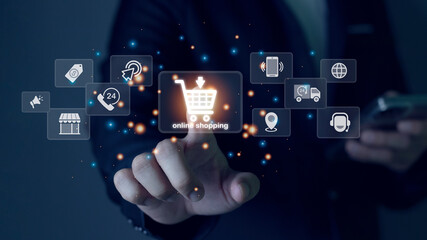 Hand holding shopping cart icon, online shopping business concept and technology