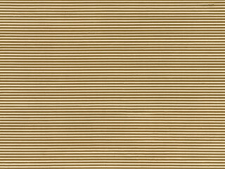 Striped facade texture in yellow golden color. Cement exterior with a horizontal relief plaster on the wall. Abstract background structure.