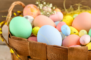 Basket with painted Easter eggs, closeup