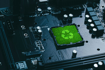 Concept of green technology. green recycle sign on circuit board technology innovations....