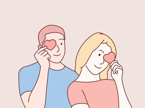 Couple Holding Red Paper Hearts Near Eyes And Smiling simple korean style illustration