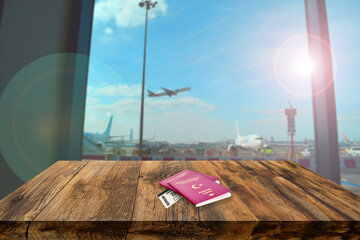 Turkish passport against to airport and flying planes. Travel concept background.