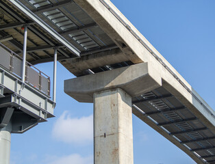 A large pole structure for electric trains or expressways. Background pattern of modern engineering technology.