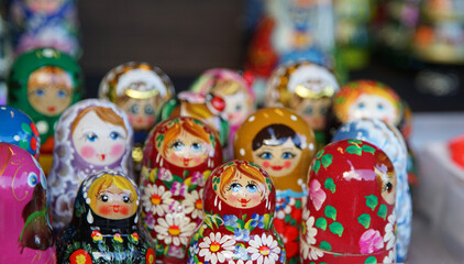 Fototapeta na wymiar Matryoshka doll of many colorful Russian souvenirs