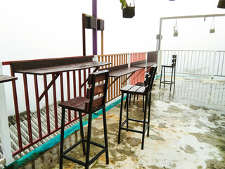 chairs and tables at an outdoor cafe