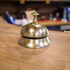 table metal bell on the bar counter