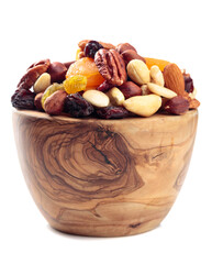 Plakat Mix of nuts and dried fruits isolated on a white background.