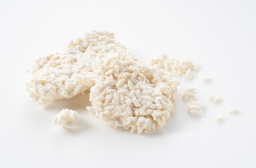 Rice malt placed against a white background. Koji mold.