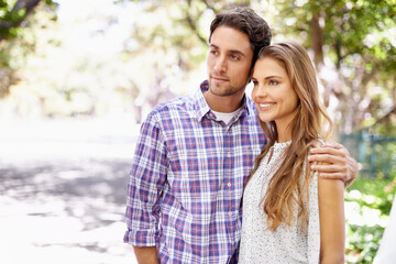 Obraz premium Couple, love and bonding embrace in garden, nature or backyard park on valentines day, romance date or summer break. Smile, happy woman and thinking man in hug for relax support or partnership future