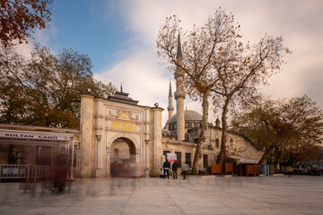 Fototapeta na wymiar Istanbul, Turkey - December 14, 2014 : People are visiting Eyup Sultan Mosque and Tomb in Istanbul. Eyup is popular tourist attraction in Istanbul, Turkey. (Eyüp Sultan Cami)
