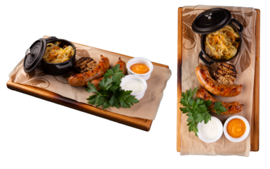 Traditional German dish. Sausages and stewed cabbage. Transparent.