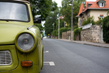 Fragment of old car on the street