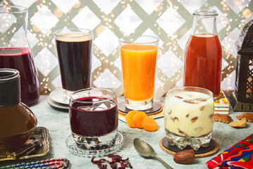 Arabic Cuisine; A variety of oriental Arabic drinks that are served in the month of Ramadan. They are delicious juices made from apricots, carob, licorice, doum palm and dates with milk.