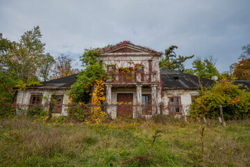 An old school in an abandoned manor house in central Poland, Europe in autumn
