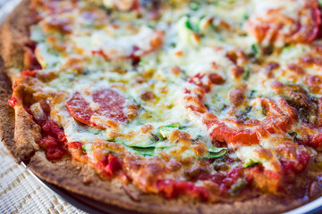 vegetarian pizza with fresh zucchini and tomatoes