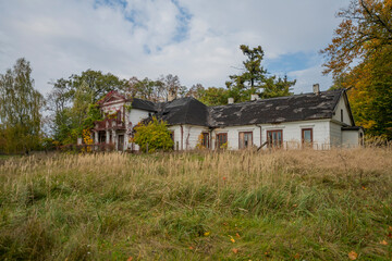 Fototapeta na wymiar An old school in an abandoned manor house in central Poland, Europe in autumn