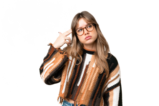 Young girl over isolated chroma key background with problems making suicide gesture