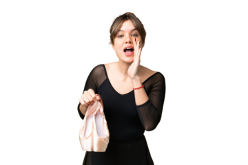 Young girl practicing ballet over isolated chroma key background shouting with mouth wide open