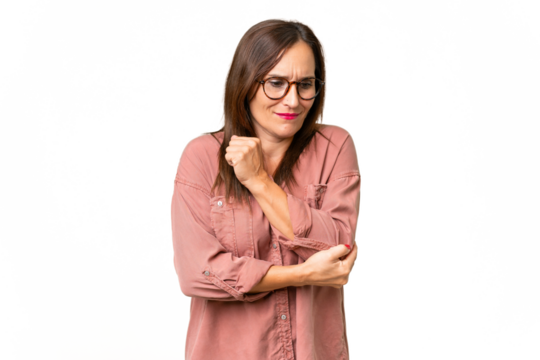 Middle-aged caucasian woman over isolated background with pain in elbow