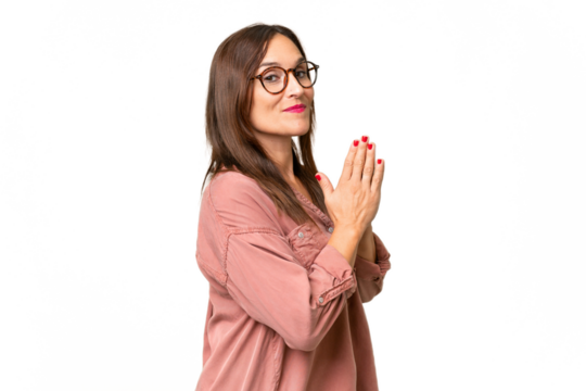 Middle-aged caucasian woman over isolated background scheming something